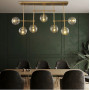 Зображення Видовжена люстра з прозорими плафонами в корпусі латунь ИМ Light-Deco 4 